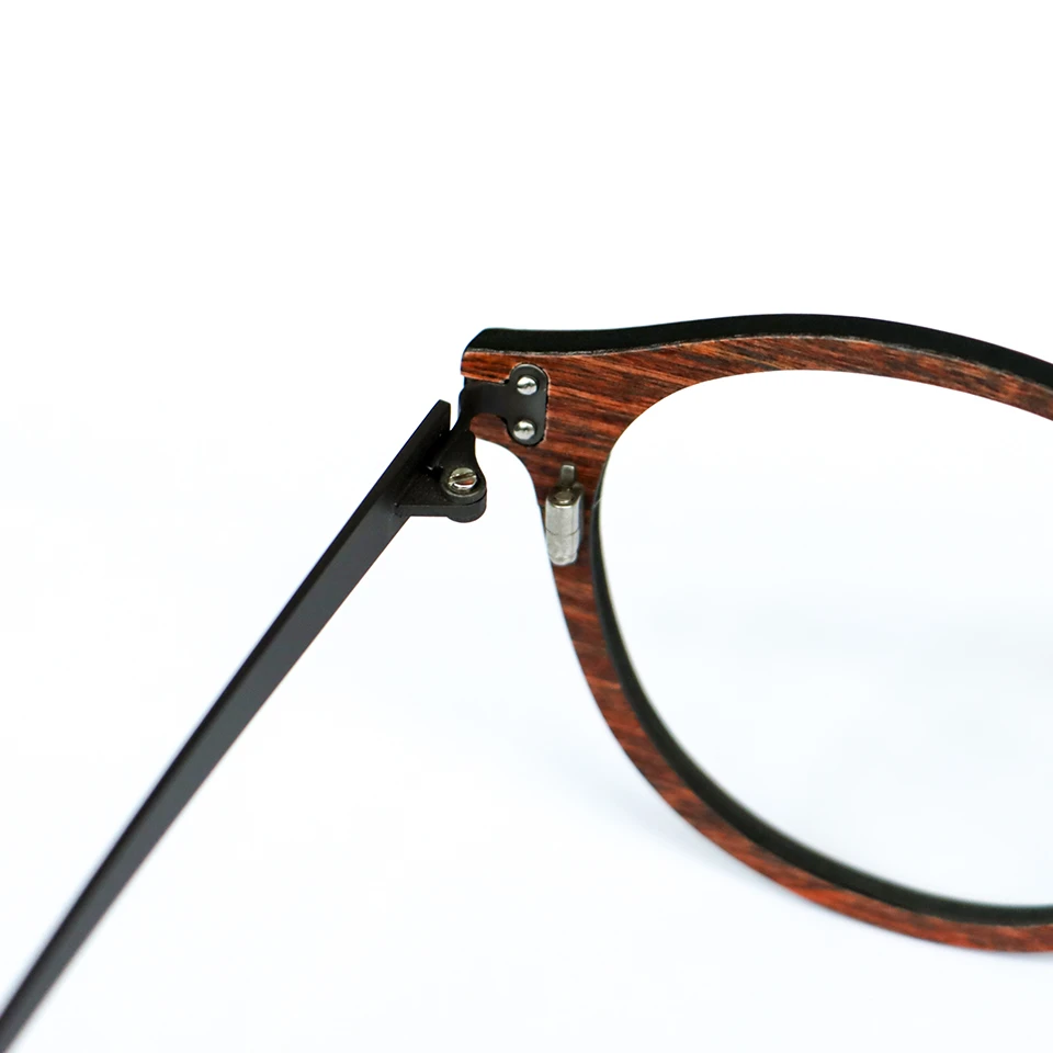 Premium optical frame factory wood carbon fiber rivet hinge detail