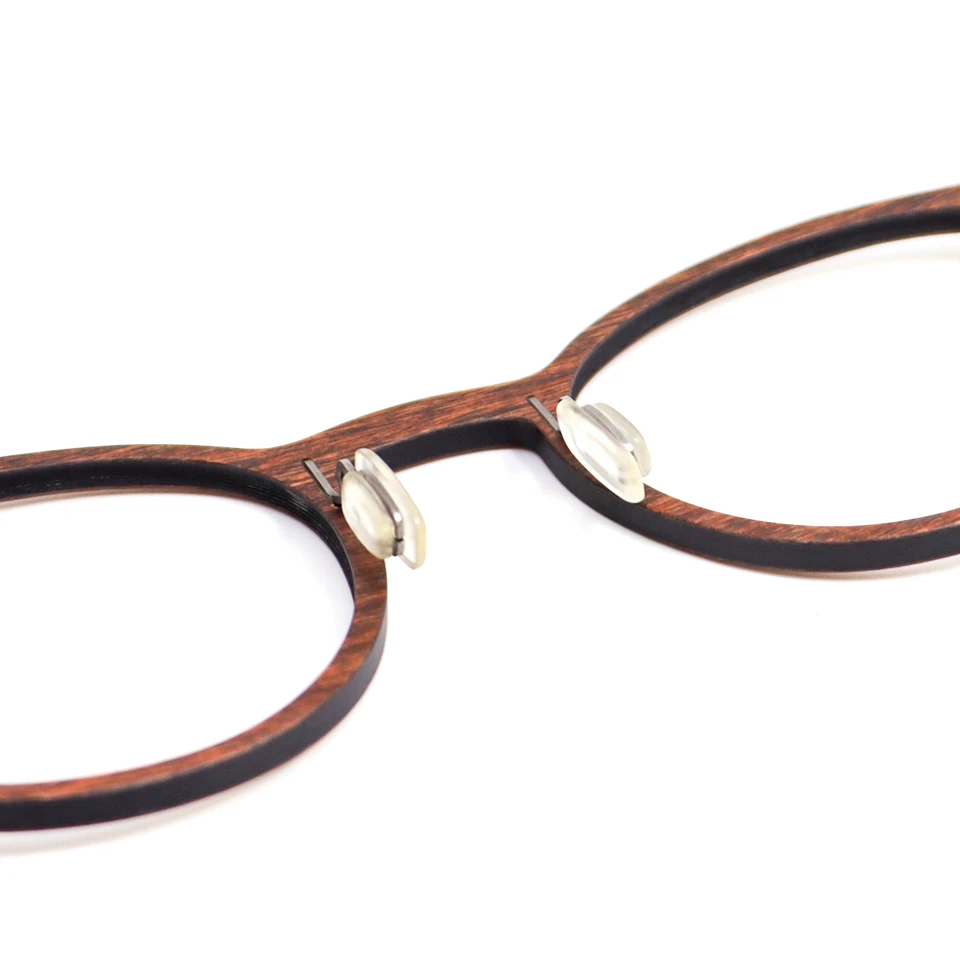 eyewear wholesale wood carbon fiber layered frame side closeup